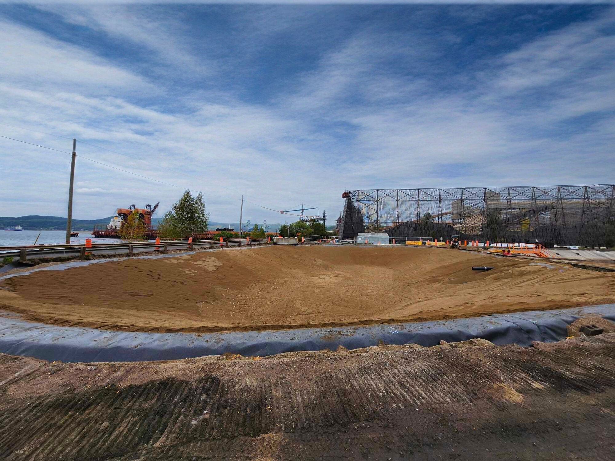 Reconstruction d’un bassin de sédimentation pour Rio Tinto | La baie Interprojet Construction | Entrepreneur général en génie civil et bâtiment au Québec